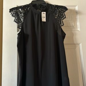 NWT Express black top, lace sleeves, cut out back. Size medium.